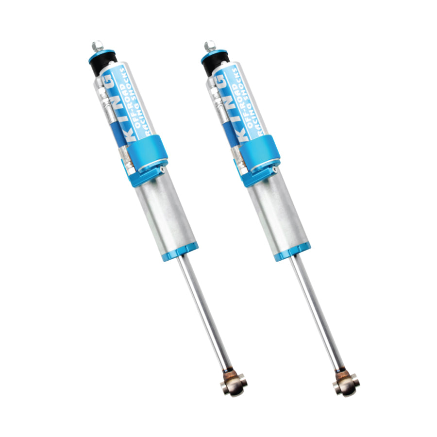 a pair of blue and silver King 2.5 Shocks with remote reservoirs