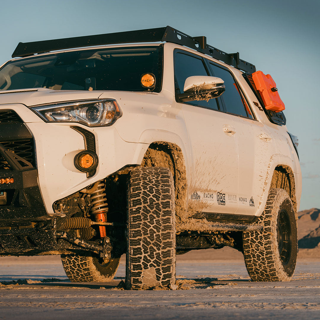 Zach Asato white 2024 4Runner with Ride Shocks lift kit in the desert at sunset