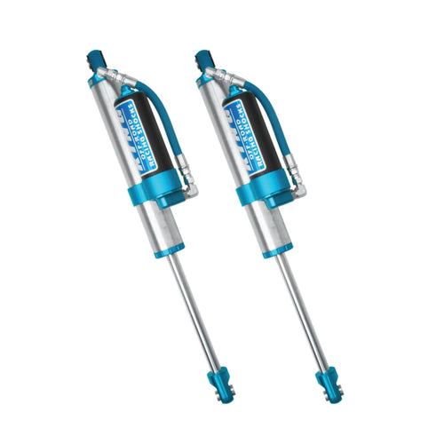 a pair of blue and silver King 2.5 Shocks with remote reservoirs from AccuTune Offroad.