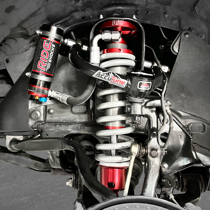 Ride Shocks coilovers for the Toyota Tacoma are a game changer. These coilovers come standard with aluminum bodies and compression adjusters. Several Ride Shocks coilovers are offered to Tacoma owners depending on the amount of weight from accessories it has. Ride Shocks are 100% designed by the team at AccuTune Offroad in San Diego, California.
