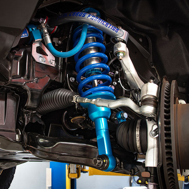 King Coilovers with Total Chaos upper control arms installed on 2024 Toyota Land Cruiser.