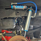 Tacoma King Shocks installed with AccuTune u-bolt flip kit.