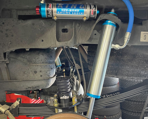 Tacoma King Shocks installed with AccuTune u-bolt flip kit.