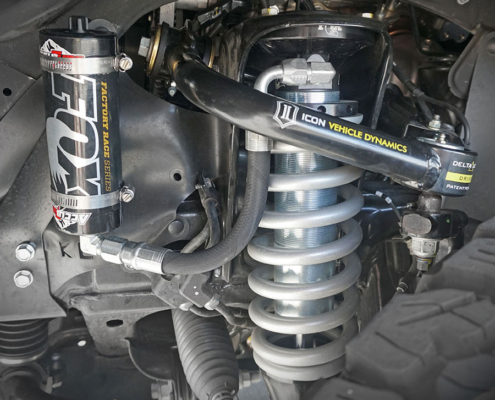 Tacoma-stage2-fox-front Fox 2.5 Coilovers installed on the front of a Toyota 4Runner with KDSS. Icon upper control arms with Delta Joints installed by AccuTune Offroad.