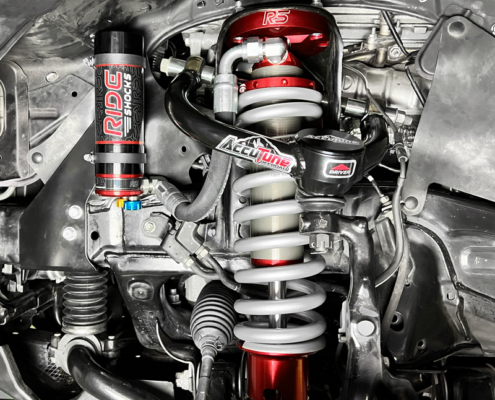 ride-shocks-4runner-coilovers_installed AccuTune Offroad upper control arm installed on a Toyota 4Runner paired with a set of Ride Shocks coilovers. This is the ultimate 4Runner suspension if you're looking for a smooth comfortable ride on the street and off-road. The Tubular steel upper control arm features heim joints at the frame pivot and an all steel ball joint at the spindle. The ball joint grease fitting is protected by the aluminum ball joint cap which is included. Upgrade your 4Runner suspension with AccuTune Offroad and Ride Shocks.