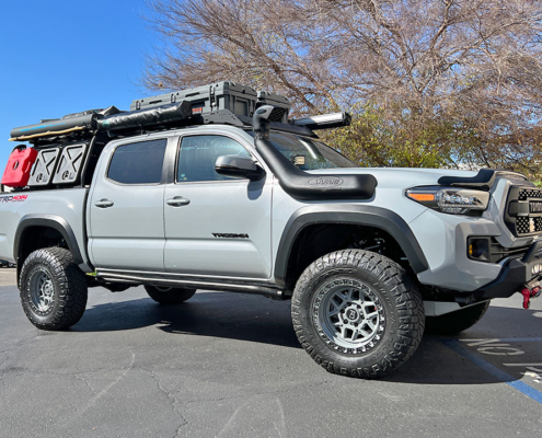3rd Gen Tacoma, upgraded with heavy duty bumpers, rock sliders, winch, bed rack and overlanding accessories. To support this Overland Built Tacoma, AccuTune Offroad complete stage kit with Fox shocks was installed.