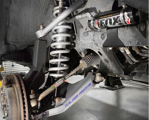 Total Chaos long travel kit with Fox Coilover shocks with DSC Adjusters
