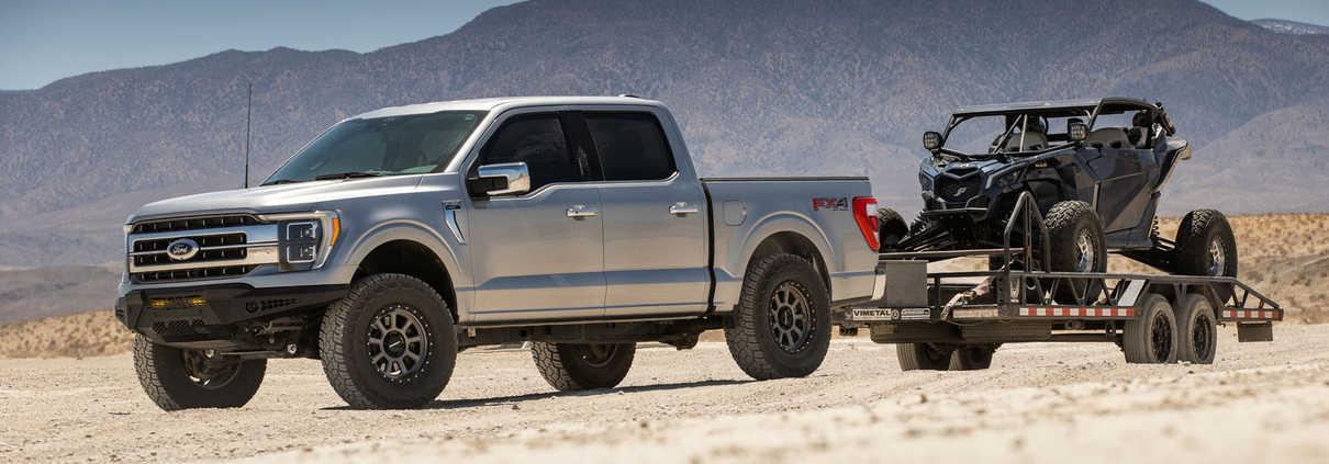 Ford F150 towing Canam X3 on trailer in Johnson Valley